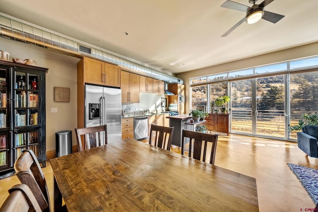 dining area featuring ceiling fan