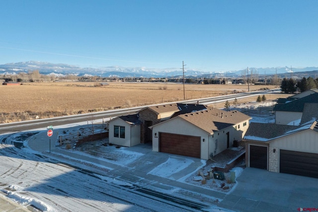 aerial view featuring a mountain view and a rural view