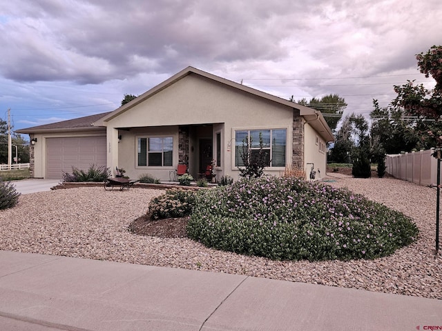 ranch-style house featuring a garage