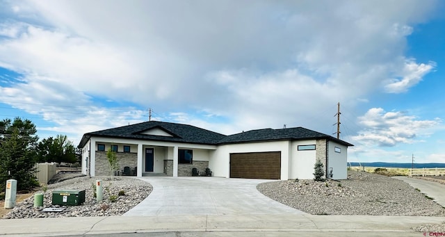 view of front of home with a garage