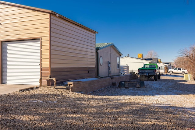 view of home's exterior featuring a garage