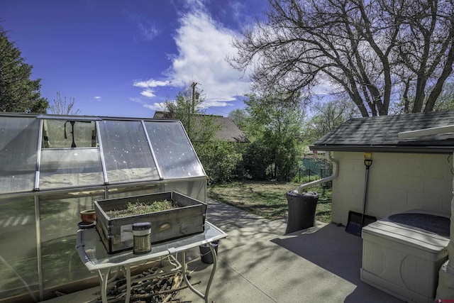 620 Tillotson St, Trinidad, CO 81082 - view of patio featuring a greenhouse and an outdoor structure