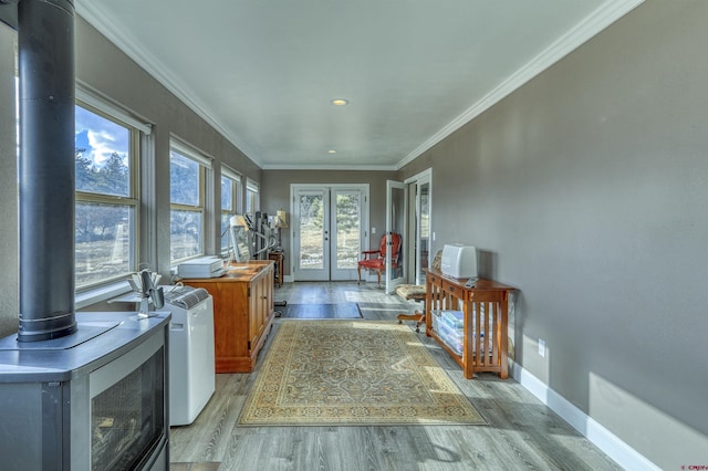 sunroom featuring french doors