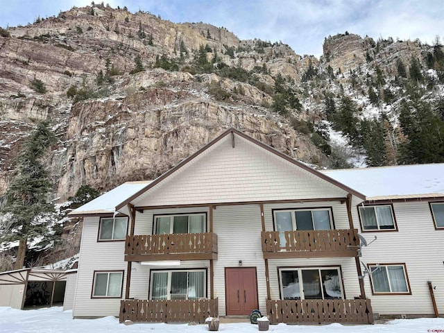 2101 Main St Unit A-2, Ouray, CO 81427 - view of front of house featuring a mountain view and a balcony