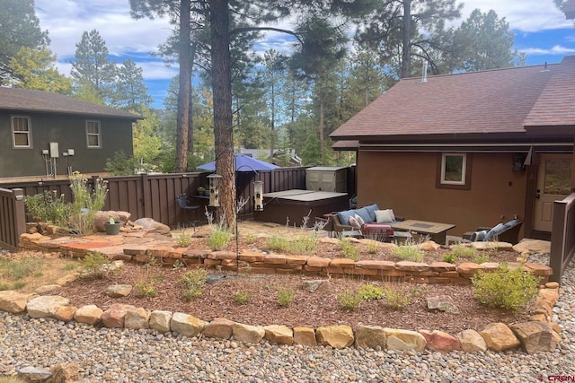 view of yard featuring a storage unit