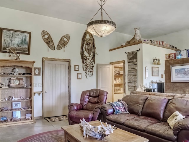 living room with a high ceiling