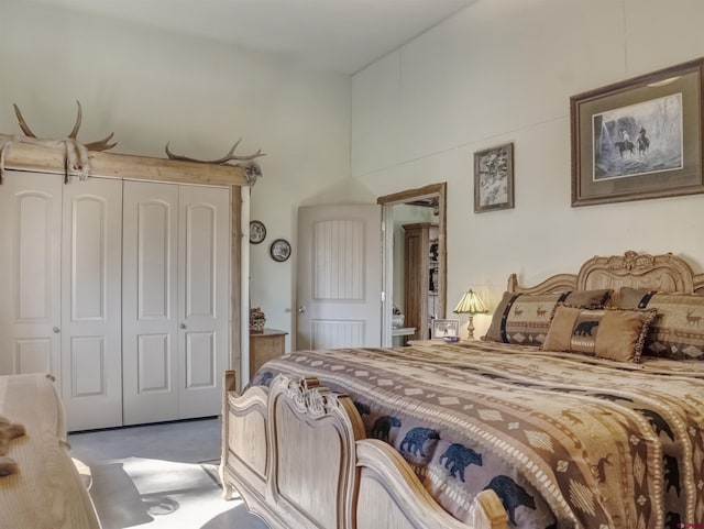 carpeted bedroom with a closet