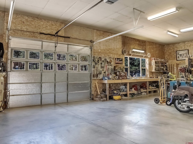 garage featuring a workshop area