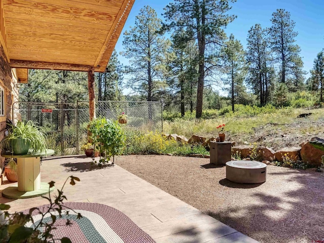 view of patio featuring a fire pit