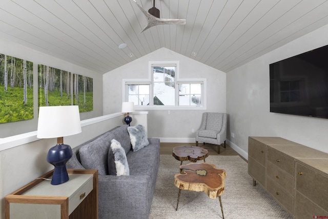 living room with lofted ceiling, wood ceiling, and light hardwood / wood-style flooring