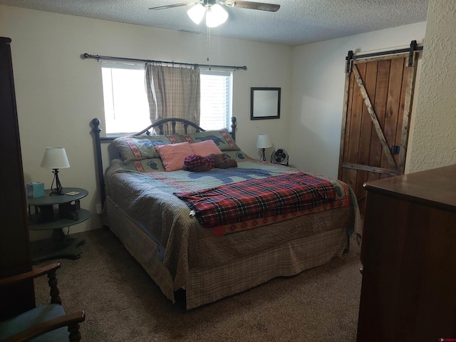 bedroom with a textured ceiling, ceiling fan, and carpet flooring