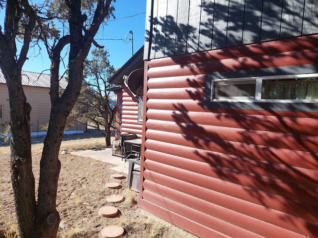 view of property exterior featuring a patio