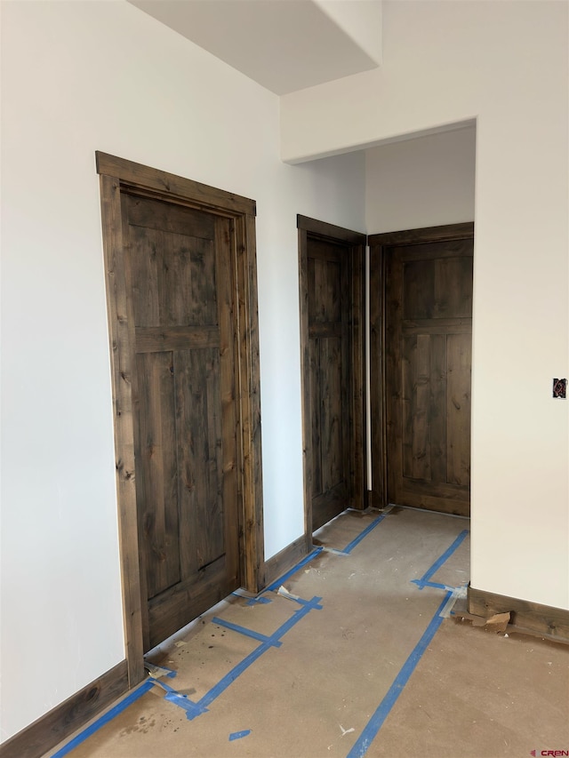 interior space with baseboards