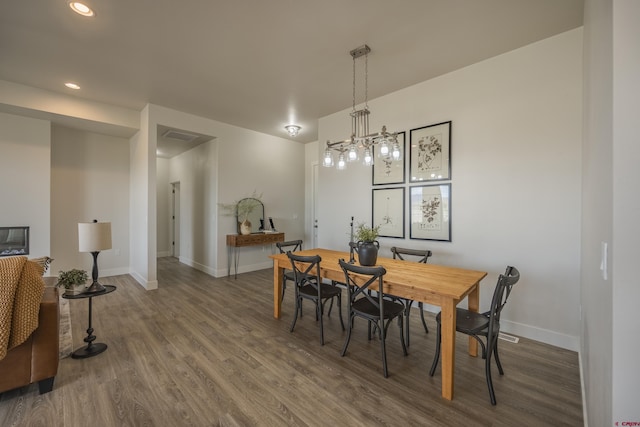 dining room featuring dark hardwood / wood-style flooring