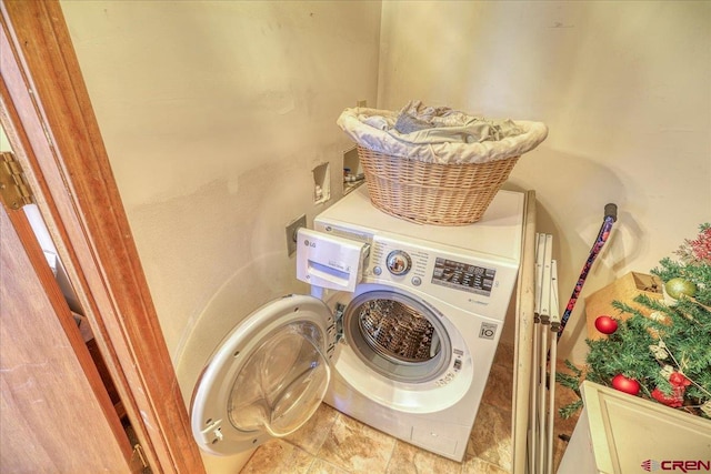 washroom featuring washer / clothes dryer