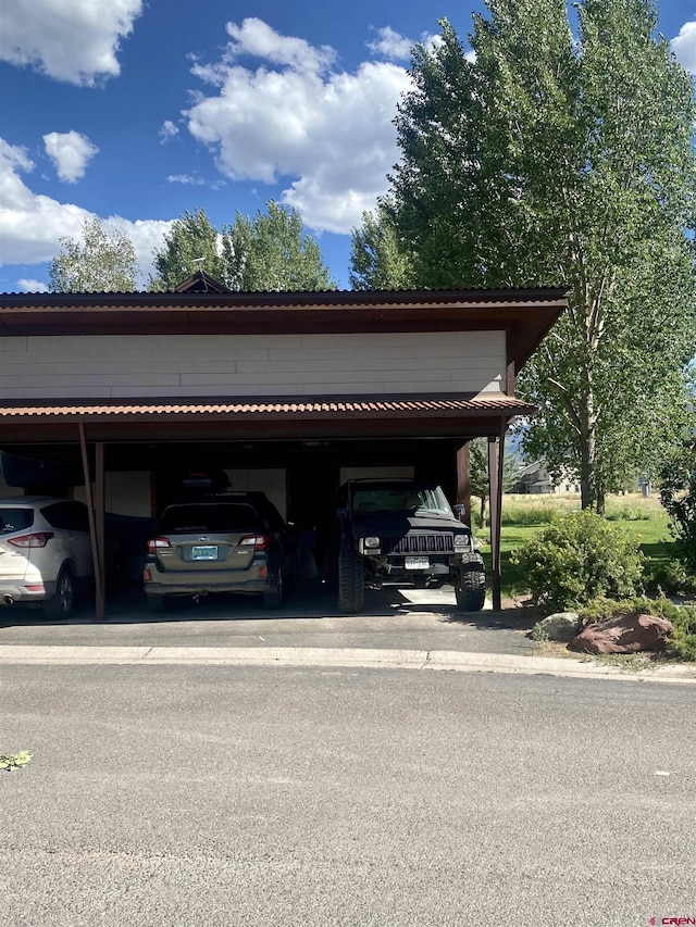 view of car parking with a carport