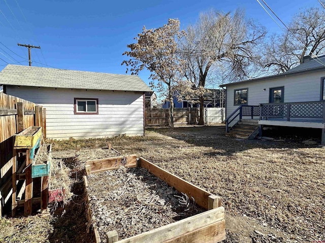 view of yard with a deck