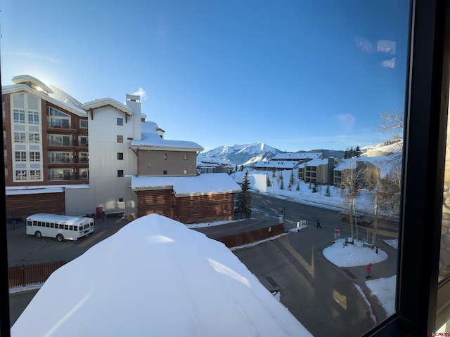 exterior space featuring a mountain view