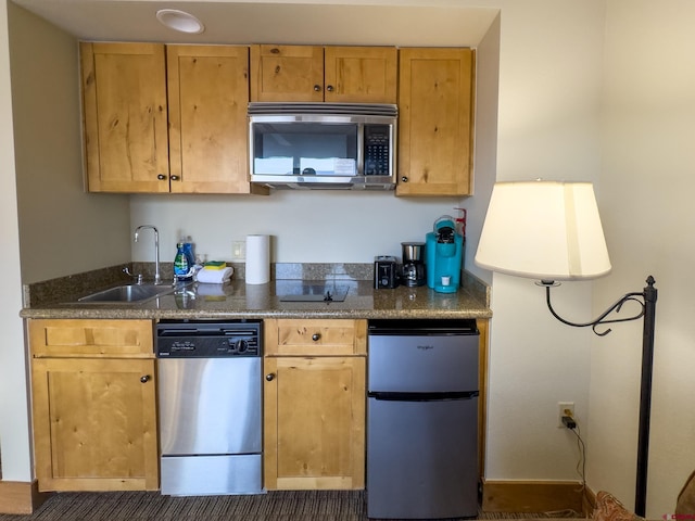 kitchen with sink and stainless steel appliances