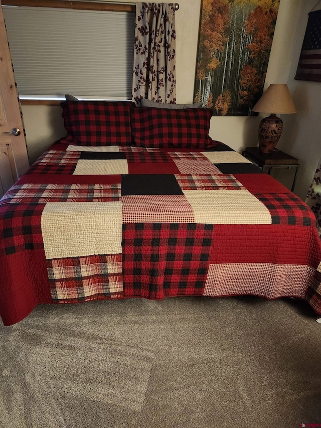 bedroom featuring carpet flooring