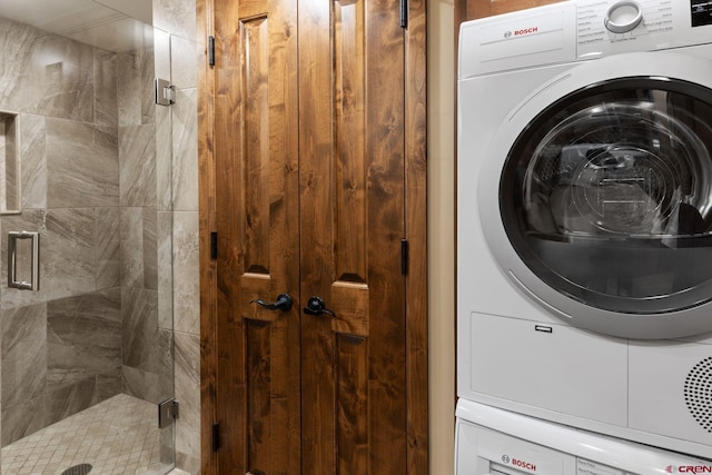 laundry room with stacked washer and clothes dryer