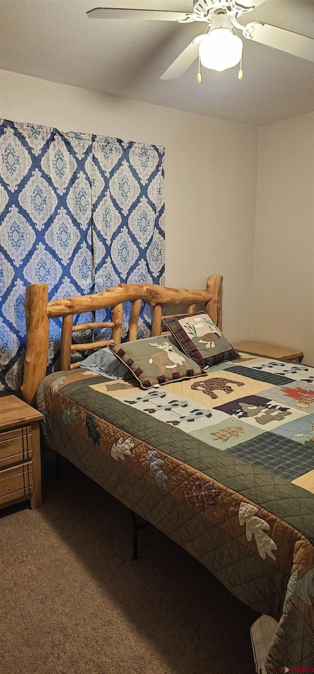 bedroom featuring carpet and ceiling fan