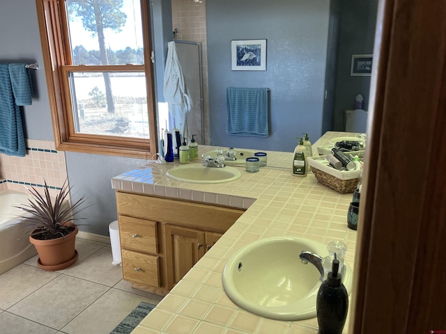 bathroom with tile patterned flooring, vanity, walk in shower, and toilet