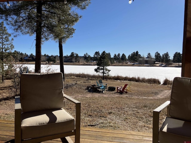 view of yard with a fire pit