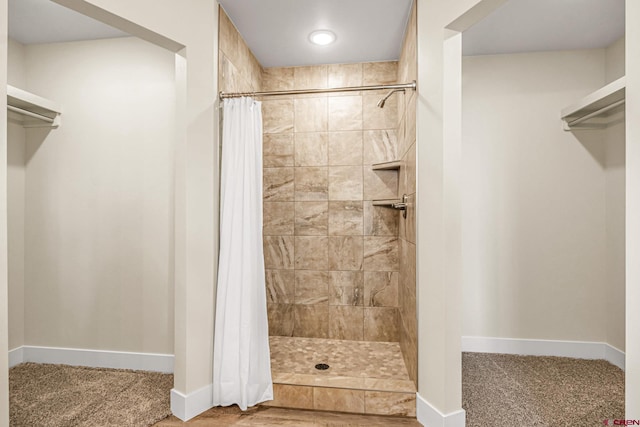 bathroom featuring a shower with curtain