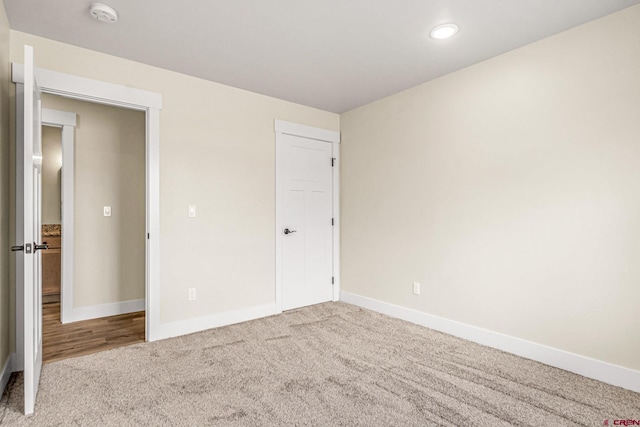 unfurnished bedroom with carpet floors