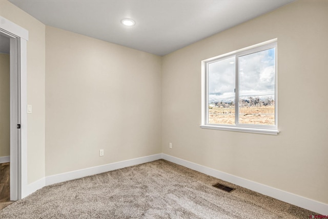 empty room featuring carpet