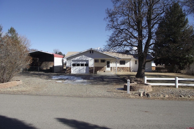 single story home featuring a carport