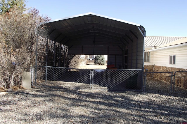 view of vehicle parking featuring a carport