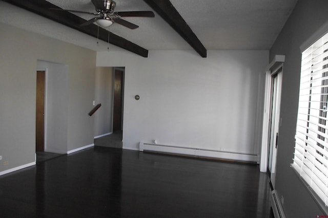 unfurnished room featuring a baseboard heating unit, beam ceiling, dark wood-type flooring, and ceiling fan