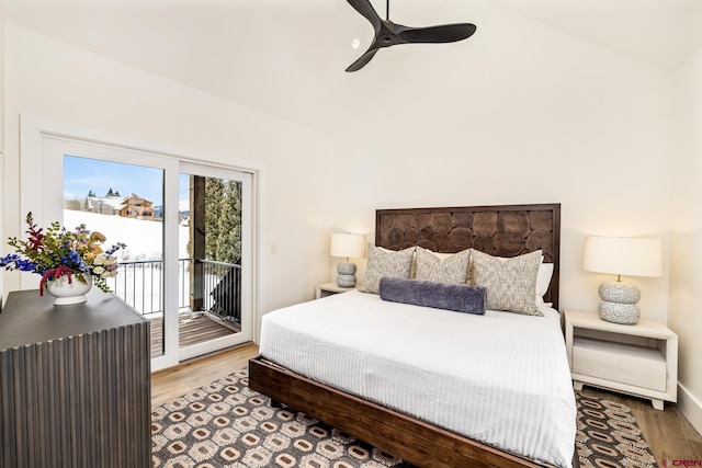 bedroom featuring vaulted ceiling, ceiling fan, hardwood / wood-style floors, and access to outside