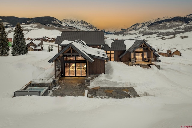 view of front facade featuring a mountain view