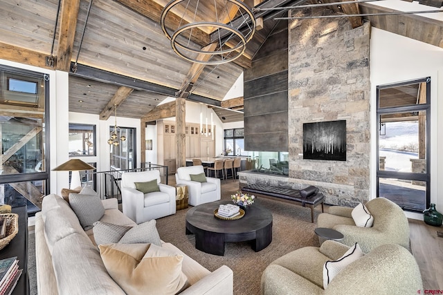 living room featuring a notable chandelier, beam ceiling, wooden ceiling, and hardwood / wood-style flooring