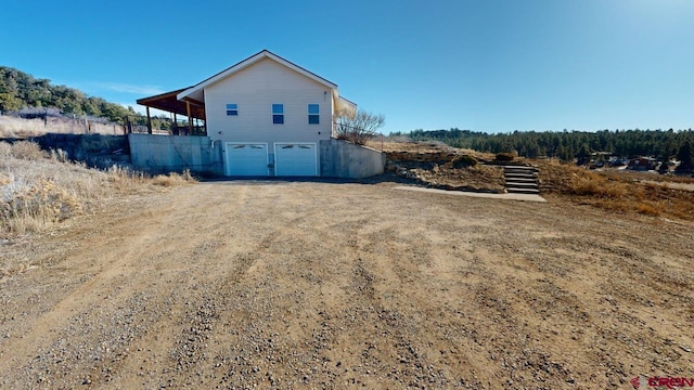 view of home's exterior with a garage