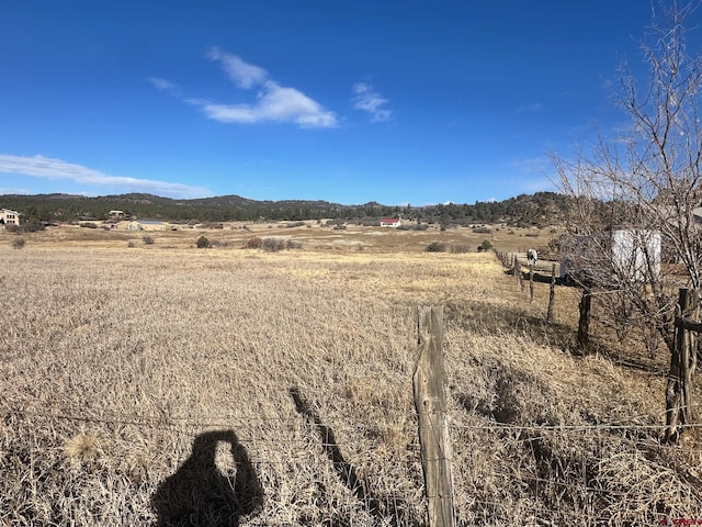 view of mountain feature featuring a rural view