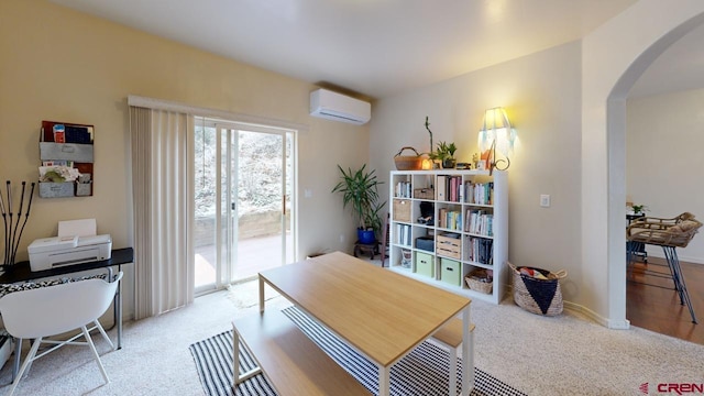 office featuring light carpet and a wall mounted AC