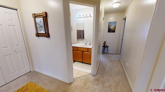 hallway featuring sink