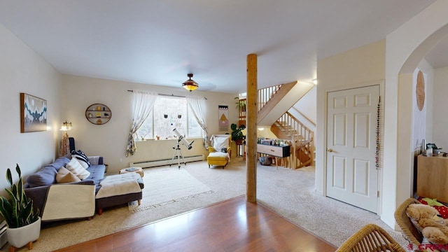 living room with a baseboard radiator and hardwood / wood-style floors