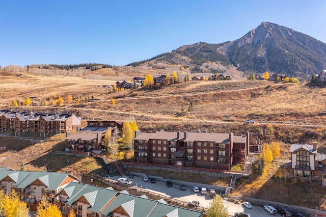 drone / aerial view featuring a mountain view