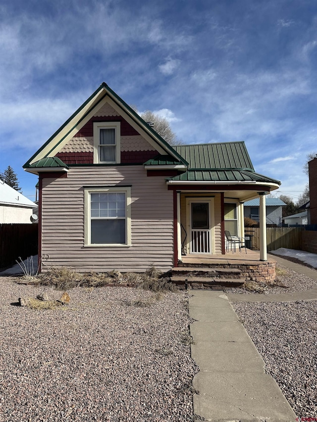 view of front of property featuring covered porch