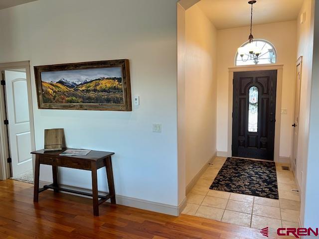 foyer with light wood-type flooring