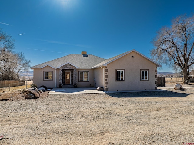 ranch-style house with a patio area