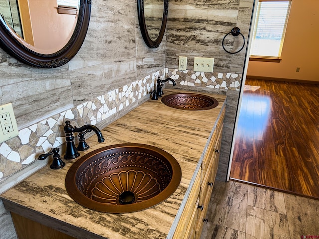 room details with vanity and wood-type flooring