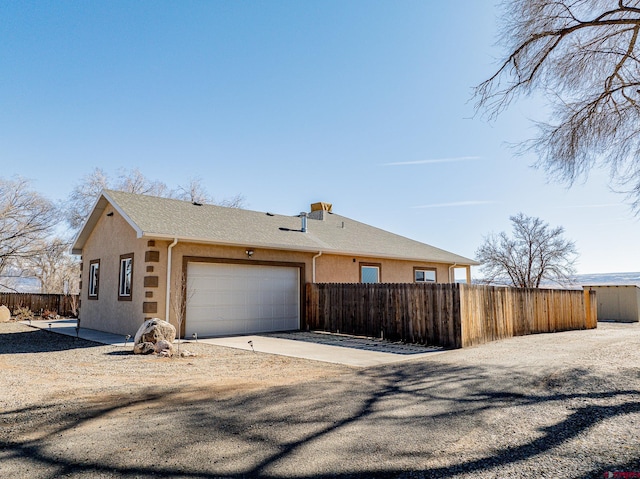 view of property exterior featuring a garage