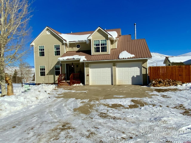 view of front of property with a garage