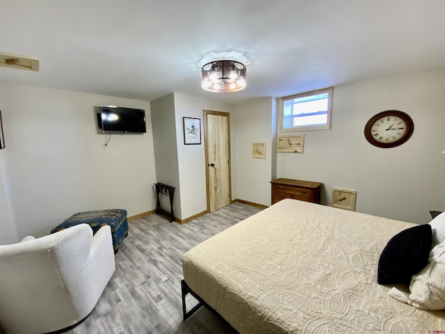 bedroom featuring light hardwood / wood-style floors